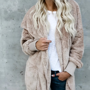 Blush pink women's teddy bear faux fur coat with long sleeves and a cozy, plush texture, perfect for winter wear.