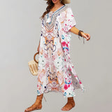 Colorful bohemian ethnic print kaftan maxi dress in rose, featuring an elegant neckline, loose sleeves, and flowing one-piece design, perfect for beachwear.