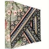 Bohemian floral print women's trousers with a relaxed fit and elastic waist, featuring a vibrant and artistic pattern.