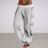 Bohemian Ink Splash Harem Pants in white with a loose fit, designed for yoga and casual wear, shown in size 3XL. The pants feature a unique splash pattern and are styled for comfort with a relaxed waist and wide legs.