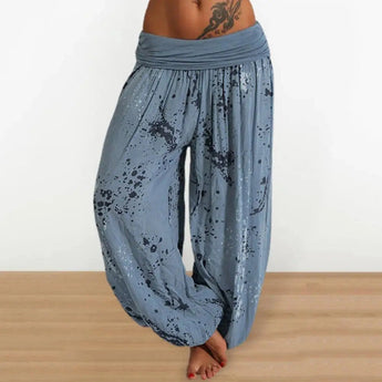 Bohemian Ink Splash Harem Pants in a loose fit design, showcasing a blue color with a comfortable 3XL size. The image highlights the pants' relaxed fit, suitable for yoga or casual wear.