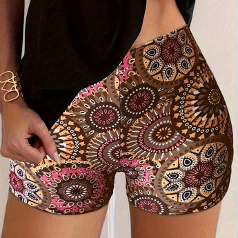 Bohemian Mandala High Waist Festival Beach Shorts featuring a vibrant summer design, worn by a person showcasing the shorts with emphasis on the waist and thigh area.
