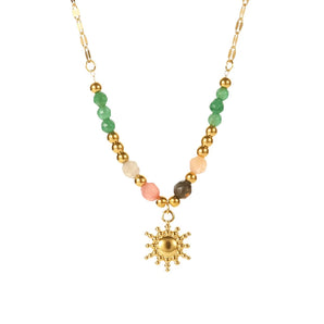 Bohemian Multi-Color Beaded Sun Pendant Necklace with Celestial Design Featuring Natural Materials and Symmetrical Beadwork