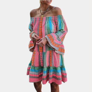 Bohemian off-shoulder tribal print dress featuring bell sleeves and a mini length.