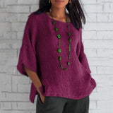 Bohemian oversized purple linen tunic for women, featuring a casual summer blouse style with a relaxed fit, visible shoulder seams, a round neckline, and long sleeves.