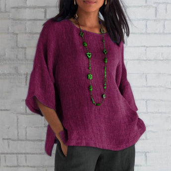 Bohemian oversized purple linen tunic for women, featuring a casual summer blouse style with a relaxed fit, visible shoulder seams, a round neckline, and long sleeves.