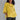 
A woman wearing a yellow oversized linen tunic, styled as a casual summer blouse. The tunic features a loose fit with wide sleeves and a relaxed collar, ideal for a comfortable and stylish look.