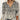 Bohemian Patchwork V-Neck Blouse in white, size 3XL, featuring a casual chic design with detailed patchwork, long sleeves, and a V-neck collar.
