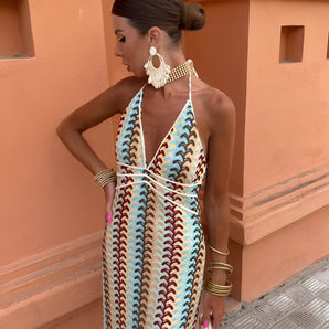 Bohemian Plunge Halter Dress in Colorful Wave design, featuring a deep neckline and halter straps, perfect for resort wear and summer fashion. The vibrant pattern and flowing fabric create an eye-catching and stylish look ideal for warm weather.