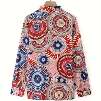 Colorful geometric mandala print V-neck blouse with tie-waist and long sleeves in magenta hues.