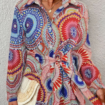 A vibrant Bohemian tie-waist blouse with a colorful geometric mandala print, featuring a V-neck design, long sleeves, and a red-orange color in size XXL.
