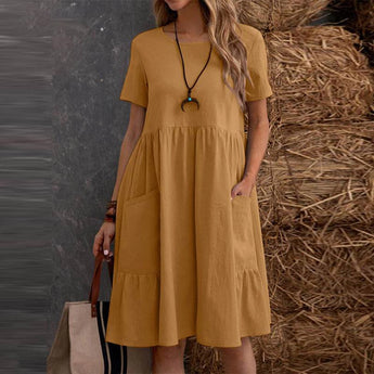 Bohemian tiered midi dress in yellow, featuring a scoop neck and short sleeves, designed for plus size, displayed with a focus on the waist and shoulder areas.
