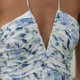 Boho Chic Blue Floral Strapless Maxi Dress with Ruffled Details, featuring a vibrant azure color and floral pattern, designed for a stylish summer look.