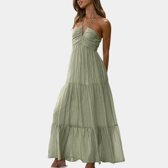 Boho Chic Blue Floral Strapless Maxi Dress with ruffled detailing, featuring a strapless design and a flowing silhouette, perfect for summer events or casual gatherings.