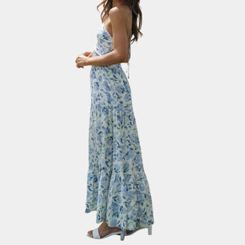 Boho Chic Blue Floral Strapless Maxi Dress with Ruffled Hem, featuring a flowing silhouette perfect for summer, displayed in a size XL.