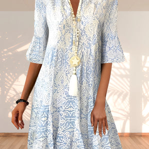 Boho Chic Blue Paisley V-Neck Bell Sleeve Summer Dress in blue, size 3XL, featuring intricate paisley patterns, a flattering v-neckline, and fashionable bell sleeves.