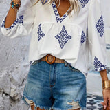 Boho Chic Ethnic Print Blouse in blue, featuring a V-neck design, long sleeves, and a relaxed fit, styled for the summer of 2023 in size XL.