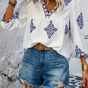 Boho Chic Ethnic Print Blouse in blue, featuring a V-neck design, long sleeves, and a relaxed fit, styled for the summer of 2023 in size XL.