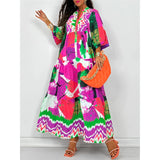 Boho Chic Long Sleeve Abstract Print Maxi Dress in vibrant pink and magenta tones, featuring a fitted waist, long sleeves, and a flowing design perfect for spring fashion.