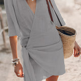 Boho-Chic V-Neck Mini Dress in Gray, size XL, styled as a summer dress and beach cover-up. The dress features a bohemian design with a flattering V-neckline, suitable for casual outings or beachwear.