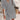 Boho-Chic V-Neck Mini Dress in Gray, size XL, styled as a summer dress and beach cover-up. The dress features a bohemian design with a flattering V-neckline, suitable for casual outings or beachwear.