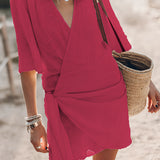 Boho-Chic V-Neck Mini Dress in red, size XL, featuring short sleeves, a fashionable V-neckline, and a lightweight fabric suitable for summer wear and as a beach cover-up.