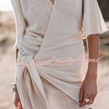 Boho-Chic V-Neck Mini Dress in white, featuring a casual and stylish design with short sleeves, perfect for summer or as a beach cover-up.