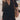 Boho-Chic V-Neck Mini Dress in Nero color, size XL, displayed on a mannequin, showcasing its black and white textile fabric, V-neckline, and stylish short sleeves.