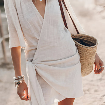 Boho-Chic V-Neck Mini Dress in Beige, XL size, featuring a trendy beach cover-up style with short sleeves, a flattering neckline, and a lightweight design perfect for summer fashion.