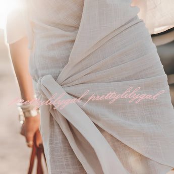 Boho-Chic V-Neck Mini Dress in Beige, featuring short sleeves, a defined waist, and a casual fit, ideal for summer wear and as a beach cover-up.