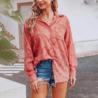 Velvet blouse in a rich red bean paste color paired with distressed denim shorts, featuring a chic boho style. The blouse has long sleeves and a relaxed fit, complementing the high-waisted design of the shorts. Perfect for a casual yet stylish look.