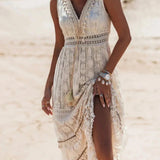 Boho Chic White Lace Maxi Dress worn by a fashion model with long hair, featuring a shoulder-baring design, elegant sleeves, and a form-fitting waist, ideal for a summer beach wedding.
