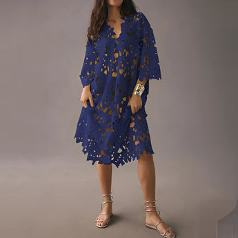 Boho Chic White Lace Midi Dress with Floral Crochet V-Neck, featuring a blue color and size 2XL. The dress has a one-piece design with short sleeves, a fitted waist, and a stylish v-neckline.