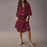Boho Chic Red Lace Midi Dress featuring floral crochet design, V-neckline, and fitted waist, with knee-length hem and short sleeves.