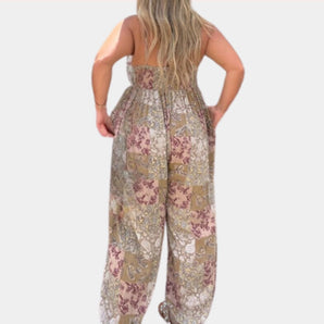 Boho Floral Sleeveless Women's Summer Jumpsuit featuring an elegant and lightweight design with a fitted waist, displaying vibrant floral patterns suitable for day wear.