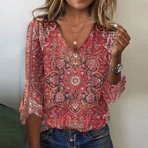 Boho floral V-neck blouse in red paisley print with 3/4 sleeves, displayed in XL size. The blouse showcases its intricate floral patterns and paisley design, perfect for a bohemian style.