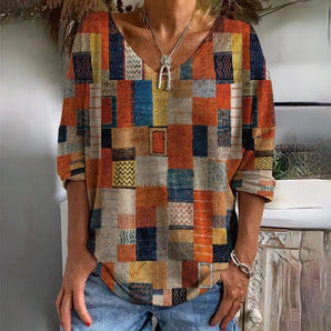 Multicolor boho patchwork blouse in a geometric print, featuring a V-neck design, short sleeves, and a loose fit suitable for summer, displayed in size 3XL.