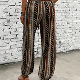 Boho women's festival pants with tribal print pattern and wide legs.