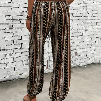 Boho women's festival pants with tribal print pattern and wide legs.