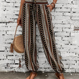 Boho Women's Tribal Print Wide Leg Festival Pants in Coffee color, size 3XL, featuring a vibrant tribal pattern and wide-leg design, suitable for casual or festival wear.