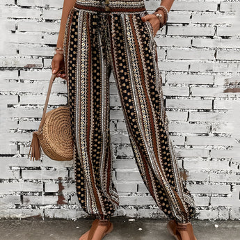 Boho Women's Tribal Print Wide Leg Festival Pants in Coffee color, size 3XL, featuring a vibrant tribal pattern and wide-leg design, suitable for casual or festival wear.