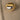 Bold gold adjustable statement ring with large reflective gemstone, close-up view showing intricate details and shimmering surface.