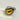 Bold gold adjustable statement ring featuring a large reflective amber heart-shaped gemstone.