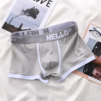 Men's black and green cotton boxers in a pack of five, showcasing comfortable and stylish undergarments with a classic pattern, ideal for everyday wear.