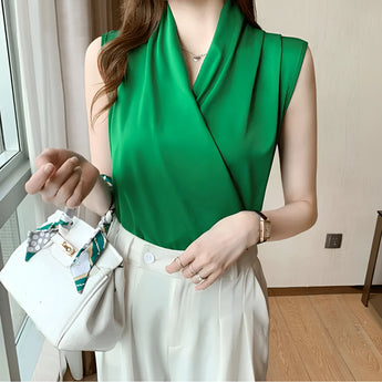 Bright green cowl neck sleeveless blouse for women, featuring a loose fit and elegant draping, designed in size 2XL.