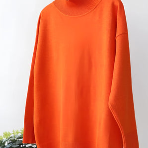 Bright orange oversized turtleneck sweater featuring a cozy knit design with long sleeves, suitable as stylish outerwear.