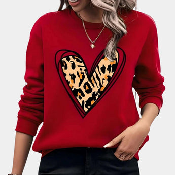 Bright oversized women's pink sweatshirt featuring a casual pullover design on a model showcasing the red XL variant. The image highlights the sweatshirt's long sleeves and relaxed fit, emphasizing the comfortable and cozy style perfect for casual wear.