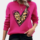 Bright oversized women's pink sweatshirt in a rose color, size XL, featuring a comfortable casual pullover design with long sleeves and a round neckline.