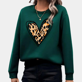 Bright oversized women's pink sweatshirt featuring a comfortable casual pullover design with a crew neck and long sleeves.
