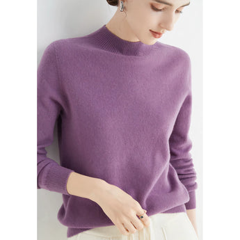 Bright red women's cashmere crew neck sweater modeled in violet, size 2XL, featuring long sleeves and a cozy winter fashion design.